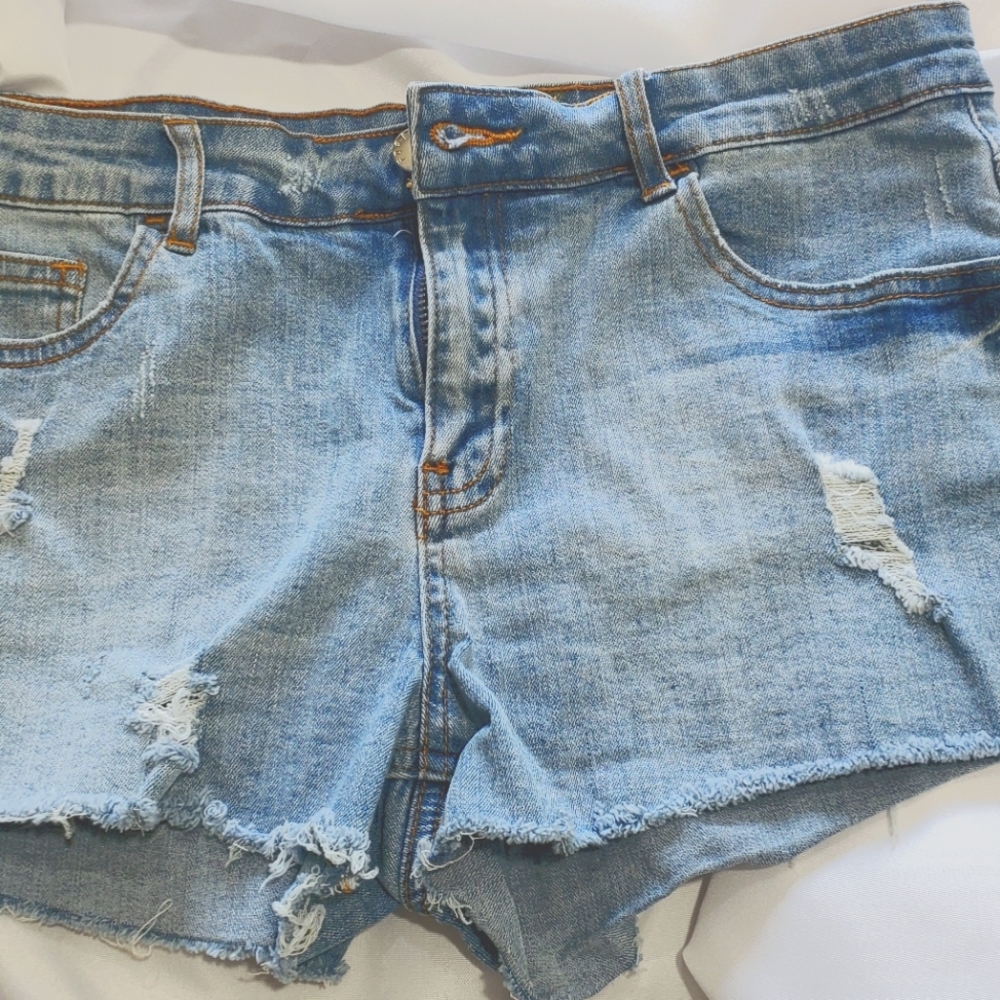 Distressed denim shorts